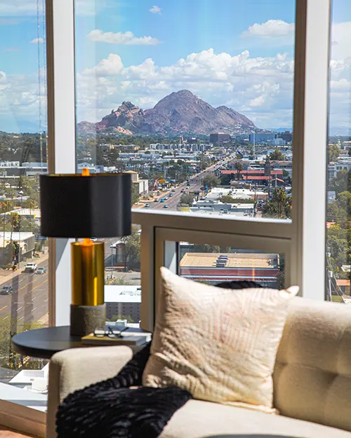 Luxury living room with floor-to-ceiling windows in Uptown Phoenix
